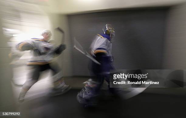 Brian Elliott of the St. Louis Blues leads the team to the ice before play against the Dallas Stars in Game Seven of the Western Conference Second...
