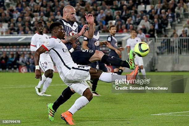 Serge Aurier of Paris Saint Germain battle for the ball with Nicolas Pallois of Girondins de Bordeaux during the French Ligue 1 match between FC...
