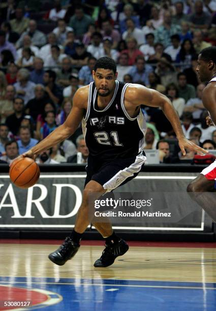 Tim Duncan of the San Antonio Spurs drives to the basket in the first half of the game against the Detroit Pistons in Game three of the 2005 NBA...