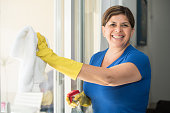 Hispanic Woman housekeeping