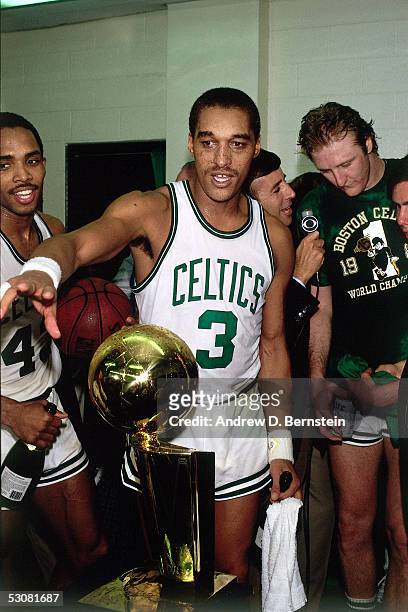 Dennis Johnson Boston Celtics celebrates in the locker room after winning game seven of the 1984 NBA Finals against the Los Angeles Lakers at The...