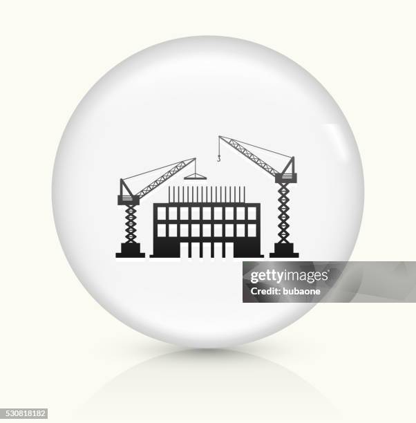 construction building icon on white round vector button - construction beam icon stock illustrations