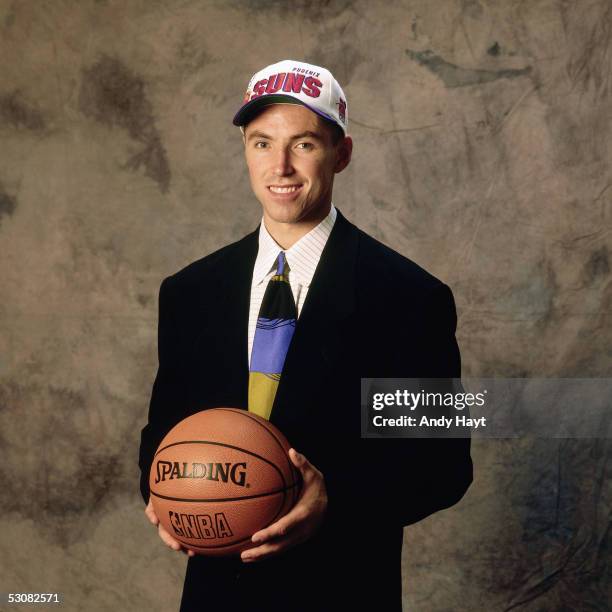 Steve Nash poses for a portrait after being drafted by the Phoenix Suns in the first round of the 1996 NBA Draft on June 1,1996 in East Rutherford,...