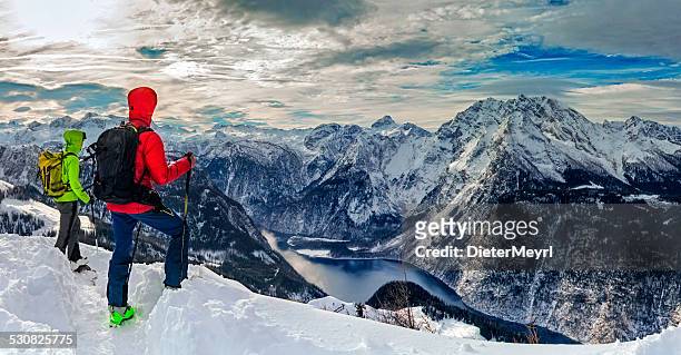 two mountain climber look to watzmann in winter - upper bavaria stock pictures, royalty-free photos & images