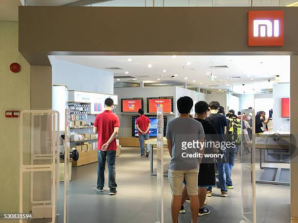 guangzhou's new xiaomi store - xiaomi stock pictures, royalty-free photos & images