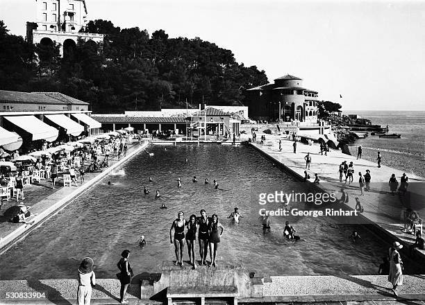Monaco: General view of a hotel swimming pool by Monte Carlo Beach, Monaco. Undated photograph. BPA2# 4881