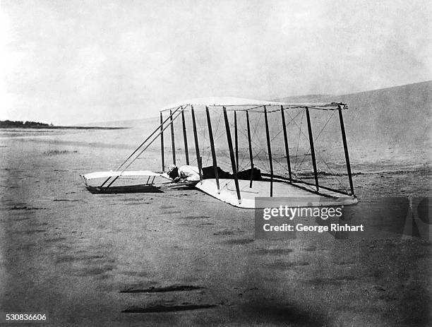 Wilbur Wright after landing the Wright Brothers' 1901 Glider. | Location: Near Kitty Hawk, North Carolina, USA.