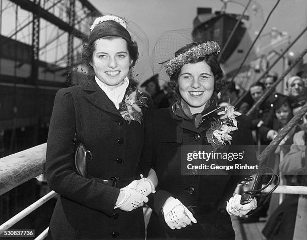 Photo shows, left to right: The Missies, Eunice and Rosemary Kennedy, as they sailed yesterday on board the S.S. Manhattan of the United States...