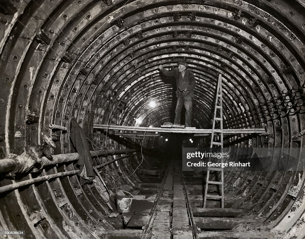 Lone Employee in Tunnel under Construction