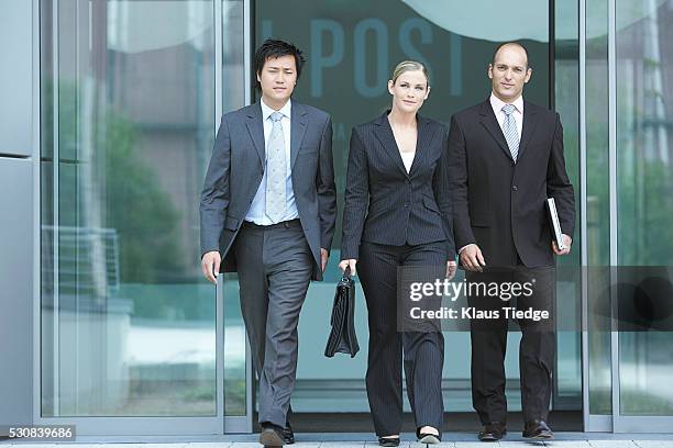 Man Walking Into Glass Door Photos and Premium High Res Pictures ...