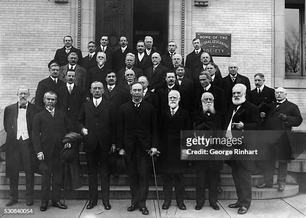 American explorer Robert Peary in group photo with National Geographic Society. Roald Amundsen is at Peary's right; American inventor Alexander...
