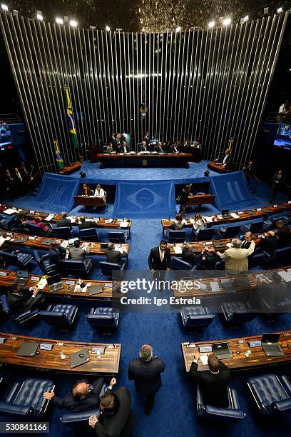 Lawmakers gather during a special session in the Brazilian Senate to vote on whether to accept impeachment charges against embattled Brazilian...