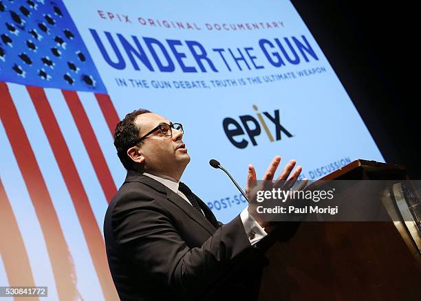 Monty Sarhan, EVP, EPIX, gives opening remarks at the UNDER THE GUN DC premiere featuring Katie Couric and Valerie Jarrett at the Burke Theater at...