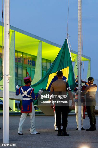 The Presidential Guard Dragons Independence change the Brazil flag on the Pal��cio do Planalto. On May 11, 2016 in Brasilia, Brazil. Embattled...