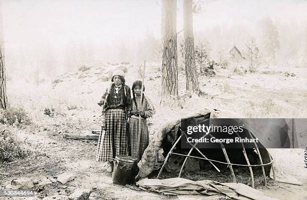 This is the manner in which the Siwash Indians believe in curing their small pox and pneumonia cases. They build a sweat hut on the bank of a creek...