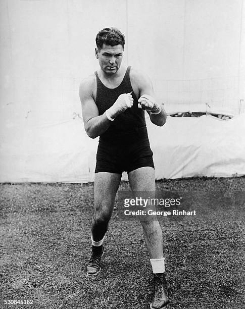 Jack Dempsey , American boxer in fighting pose. One of the greatest boxers of all time. His rematch with Gene Tunney involved the controversial "long...