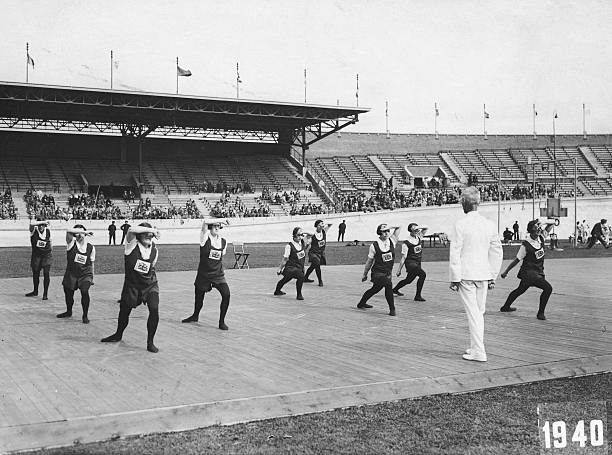 The British Women's Gymnastics team at the Olympic Stadium during the 1928 Olympic Games ion Amsterdam. The '1940' figure at bottom right is an image...