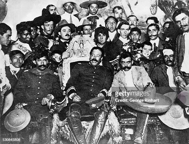 PANCHO VILLA AND EMILIANO ZAPATA SURROUNDED BY SUPPORTERS, CA.1915. PHOTOGRAPH.