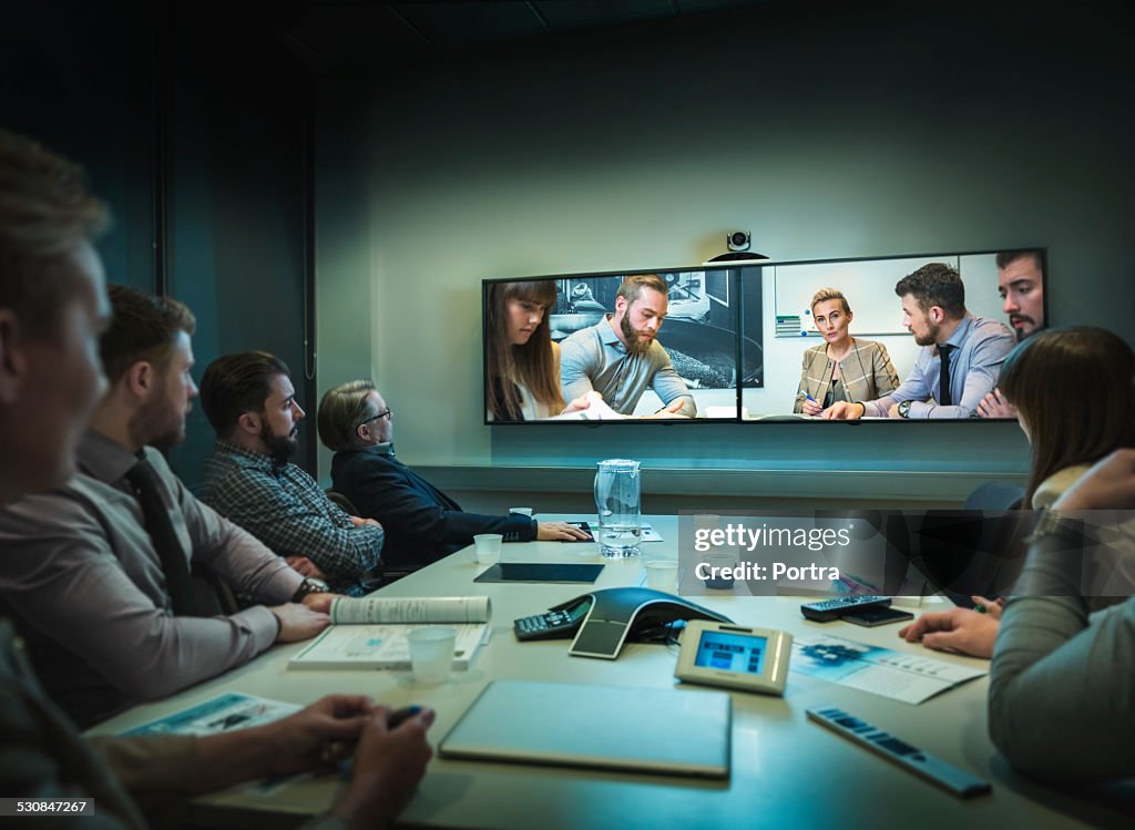 Businesspeople having video conference at office