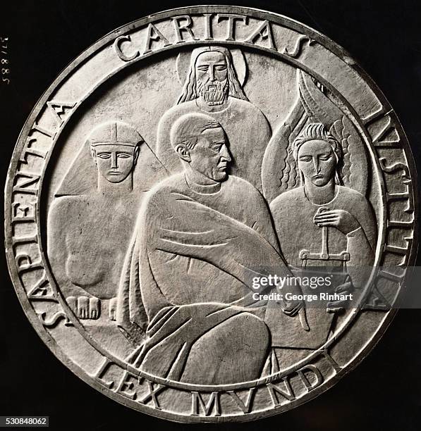 Photo of the bronze medal, 10 inches in diameter, designed by Mestrovic, which will be presented to Viscount Cecil of Chelwood, together with a check...