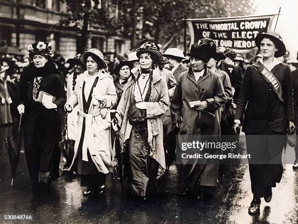Enormous crowds of women thronged Victoria Embankment, despite a drizzling rain, to participate in the women's procession voicing the demand that the...