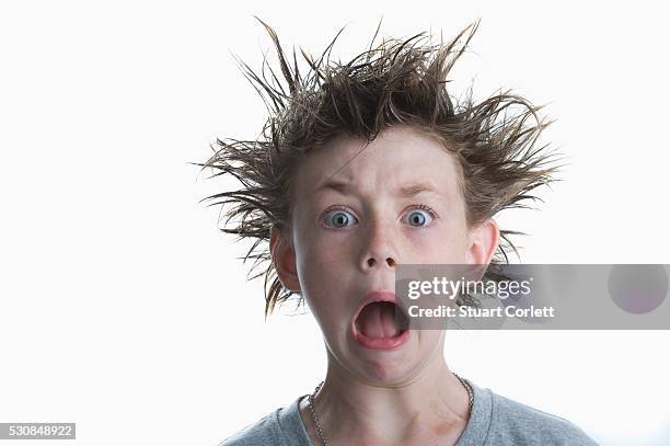boy with crazy hair - spiky hair stock pictures, royalty-free photos & images