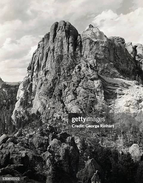 Mount Rushmore with the head of Washington as it was on the tenth of October, 1929.