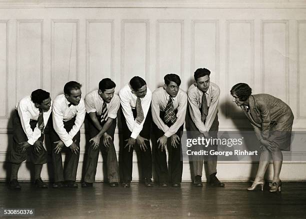 Rehearsal of the "all 'YS' Crackers" Revue and Minstrel Show, which is put on by the members and employees of the west Side YMCA of 318 West 57th...