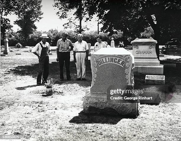 John Dillinger . His burial place, beside the grave of his mother, in the family plot in a small cemetery just outside Indianapolis.