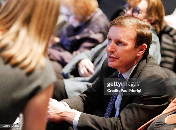 Sen. Chris Murphy talks with a guest at the UNDER THE GUN DC premiere featuring Katie Couric and Valerie Jarrett at the Burke Theater at U.S. Navy...