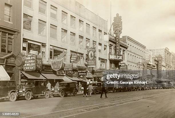 View of businesses on the north side of 125th Street , including Hurtig & Seamon's New Burlesque Theater , in the Harlem neighborhood, New York, New...
