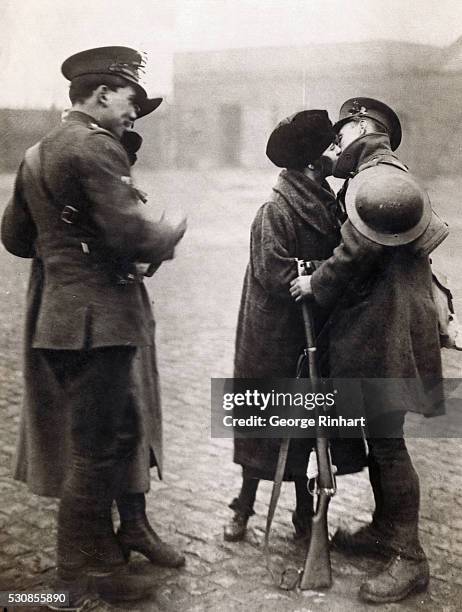 "The Gal I Left Behind Me" might be the title for this photo, snapped as the very last of the Crowned Forces were evacuating their barracks in...