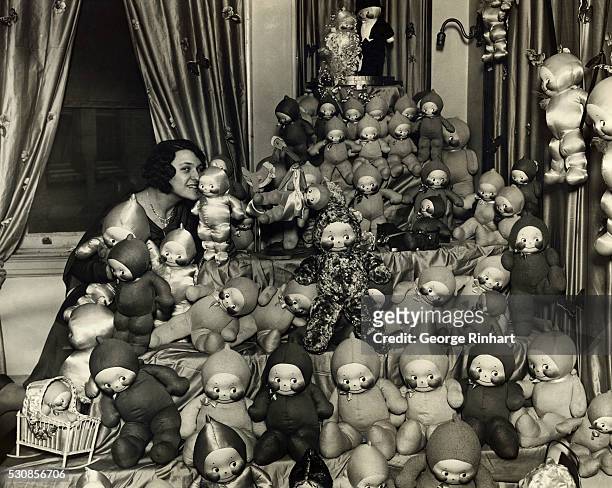 The Kewpie 1930 model, an ocean of them, being called to order by Miss Ursula Seiz at the New York Toy Fair, which is being held at the Breslin,...