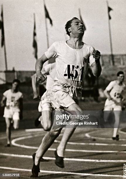 Remarkably sharp "shot" showing Eric Liddell of the University of Edinburgh, winning the 400-meter finals in the Olympic Games at the Colombes...