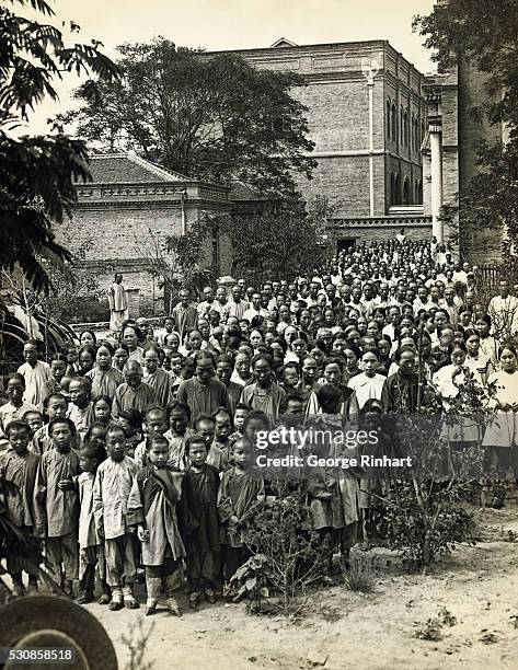 Chinese Christian refugees in the Apostolic Mission during the bombardment of the Tientsin at the time of the boxer rebellion in 1900.