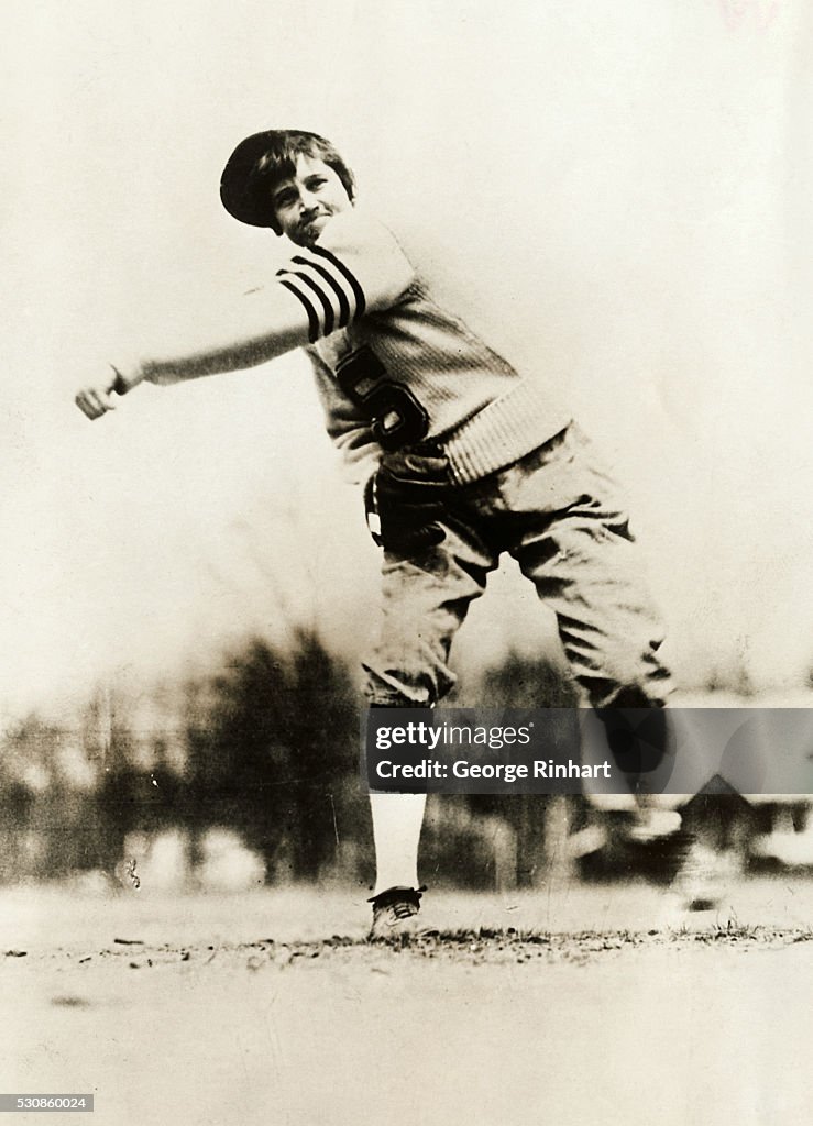 Young Jackie Mitchell in Pitching Action