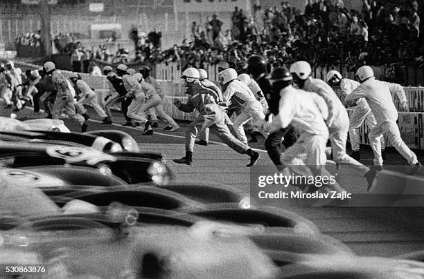 Motor racing drivers run to their cars at the start of the 1973 Le Mans 24 hour race. | Location: Near Le Mans, France.