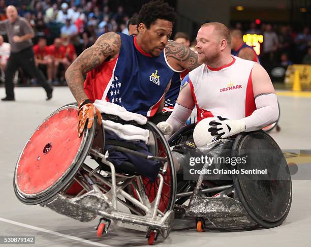 Player Anthony McDaniel, LEFT, collides with Denmark'S Mark Peters, RIGHT, during the gold medal wheelchair rugby gold medal match at the Invictus...