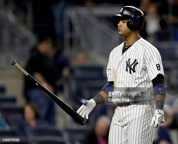 Starlin Castro of the New York Yankees reacts after he struck out to end the ninth inning against the Kansas City Royals at Yankee Stadium on May 11,...