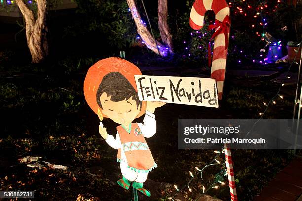 Feliz Navidad sign outside one of the decorated homes in the Henry T. Oxnard National Historic District, part of the annual Christmas Tree Lane...