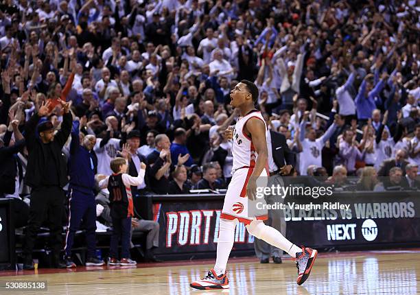 Kyle Lowry of the Toronto Raptors celebrates a 3-pointer late in the second half of Game Five of the Eastern Conference Semifinals against the Miami...