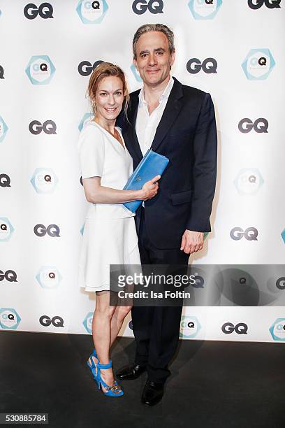 Actress Lisa Martinek, wearing a dress by Hugo Boss and a handbag by Prada, and her husband Giulio Ricciarelli attend the GQ Care Award 2016 at The...