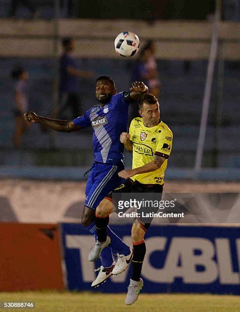 Gabriel Achilier of Emelec and Damian Diaz of Barcelona fight for the ball during a match between Emelec and Barcelona SC as part of Campeonato...