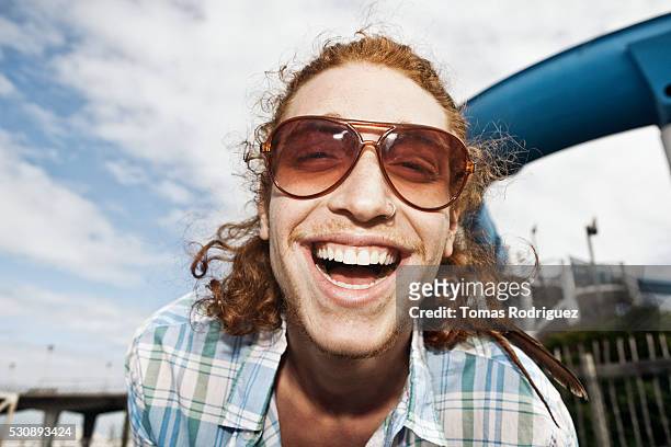 young man smiling - ginger bush stock pictures, royalty-free photos & images