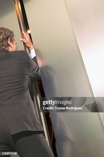 Stuck Trapped In Elevators Photos and Premium High Res Pictures - Getty Images