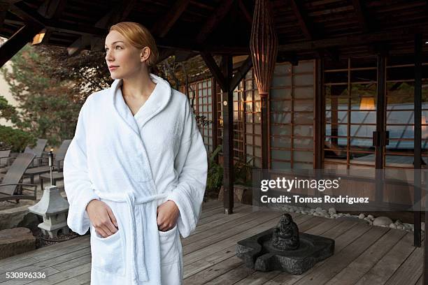 woman at spa - bademantel stock-fotos und bilder