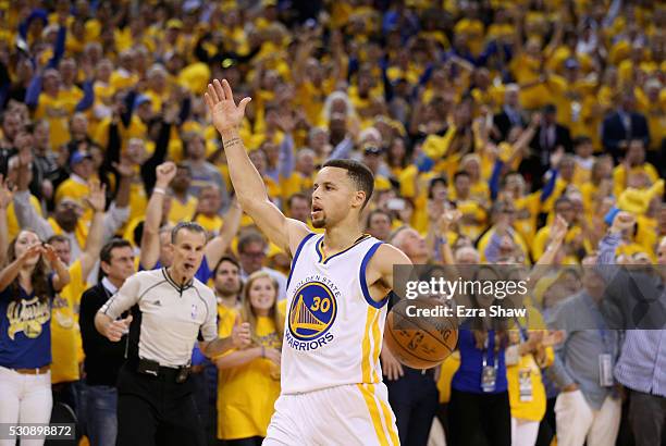 Stephen Curry of the Golden State Warriors runs down court during the finals seconds of their win over the Portland Trail Blazers in Game Five of the...