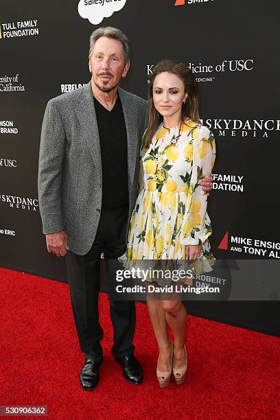 Larry Ellison and Nikita Kahn arrive at the 3rd Biennial Rebels with a Cause Fundraiser on May 11, 2016 in Santa Monica, California.