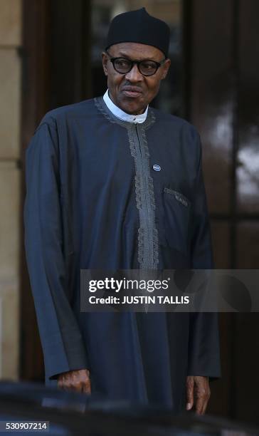 Nigerian President Muhammadu Buhari arrives to attend the Anti-Corruption Summit London 2016, at Lancaster House in central London on May 12, 2016. -...