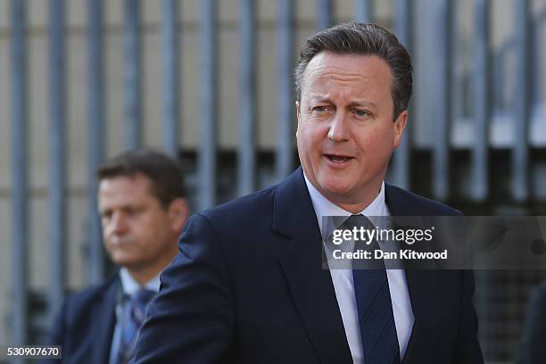 British Prime Minister David Cameron arrives at Lancaster House to host the international anti-corruption summit on May 12, 2016 in London, England....